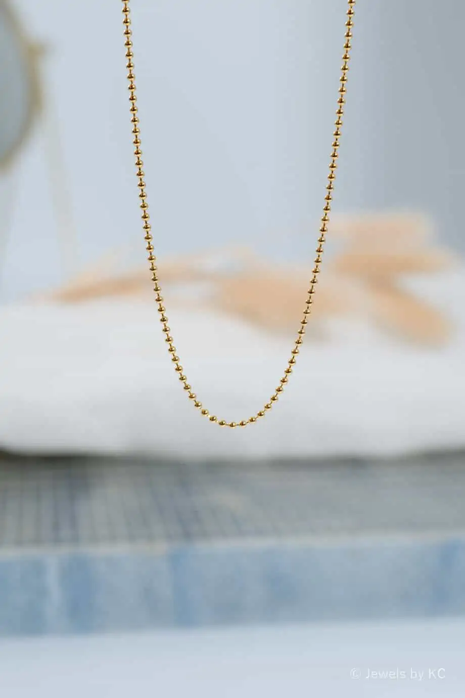 Gouden balletjes ketting ball chain van Goud op Zilver