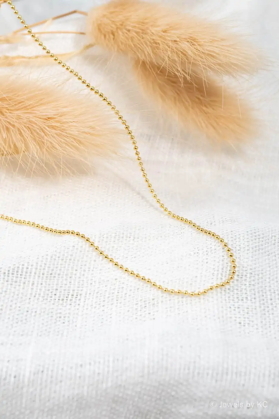 Gouden balletjes ketting ball chain van Goud op Zilver