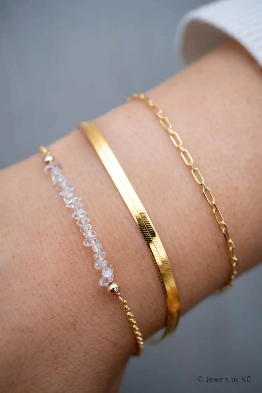 Gouden armband snake chain dunne platte armbandje van Goud op Zilver