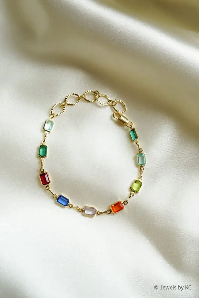 Gouden armband met gekleurde Zirkonia steentjes regenboog baguette armbandje van Gold filled