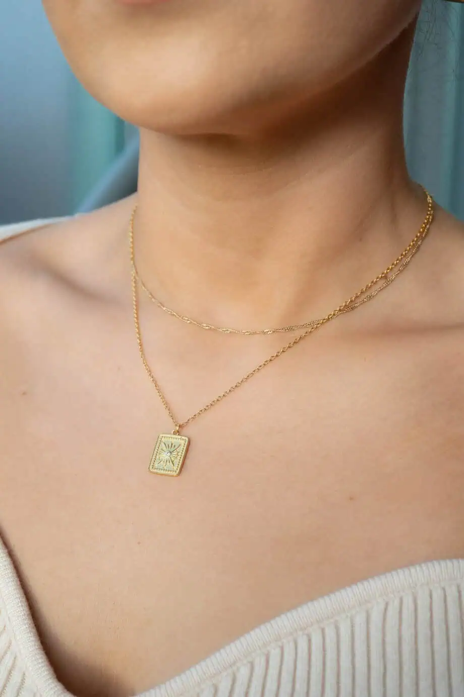 Gouden ketting met amulet hanger zonnetje van Goud op Zilver